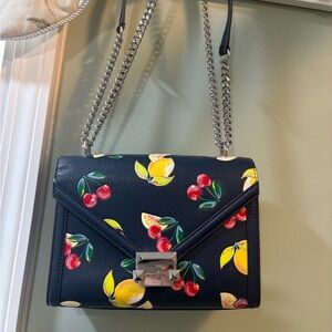 Micheal Kors Dark Blue Crossbody Bag with Fruit Design.